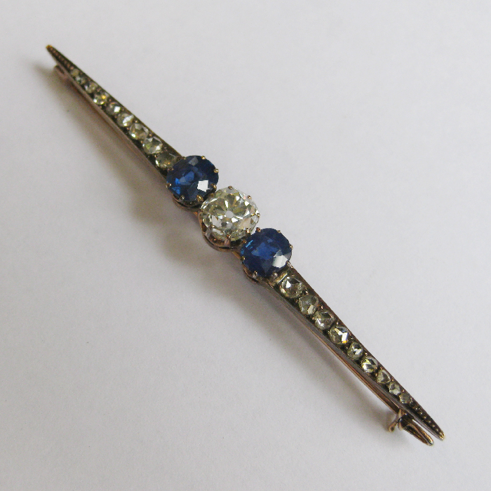 Speld diamant saffier